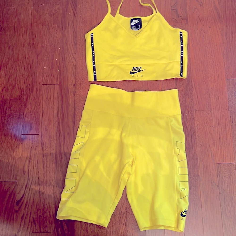 Yellow Nike air workout shorts and top
